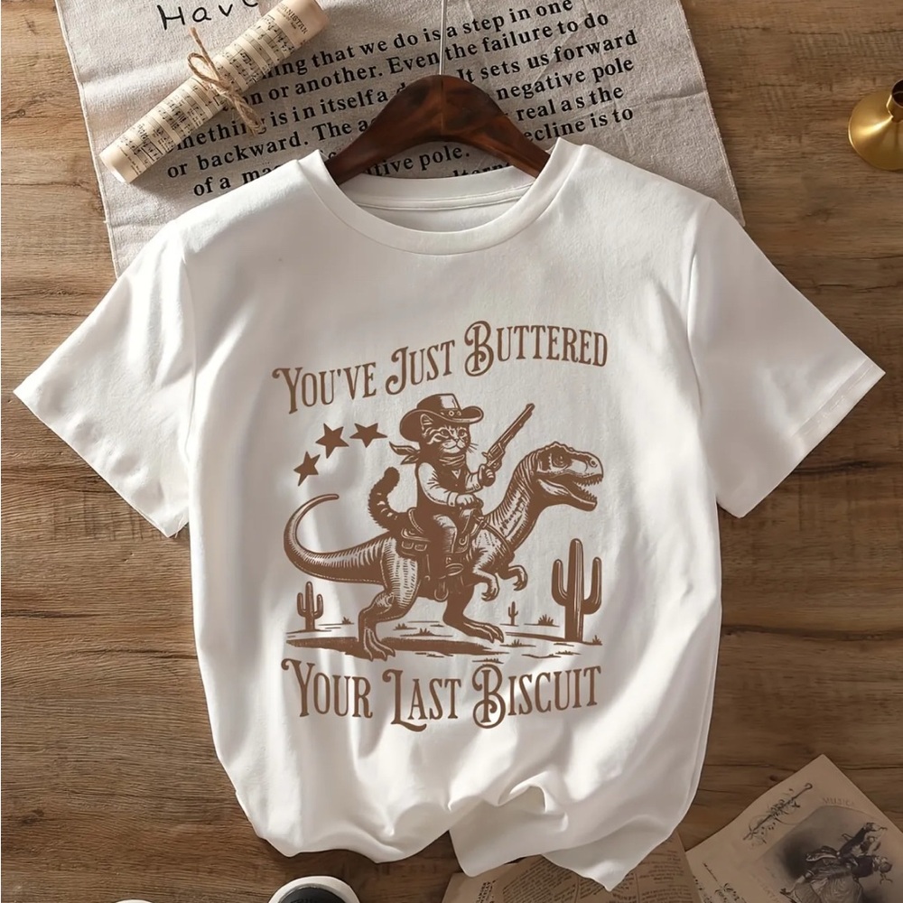 White Graphic T-Shirt with Cowboy Dinosaur Print